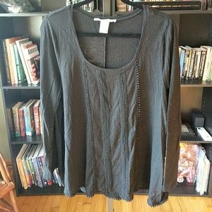 Black long sleeved top with pom-pom detail